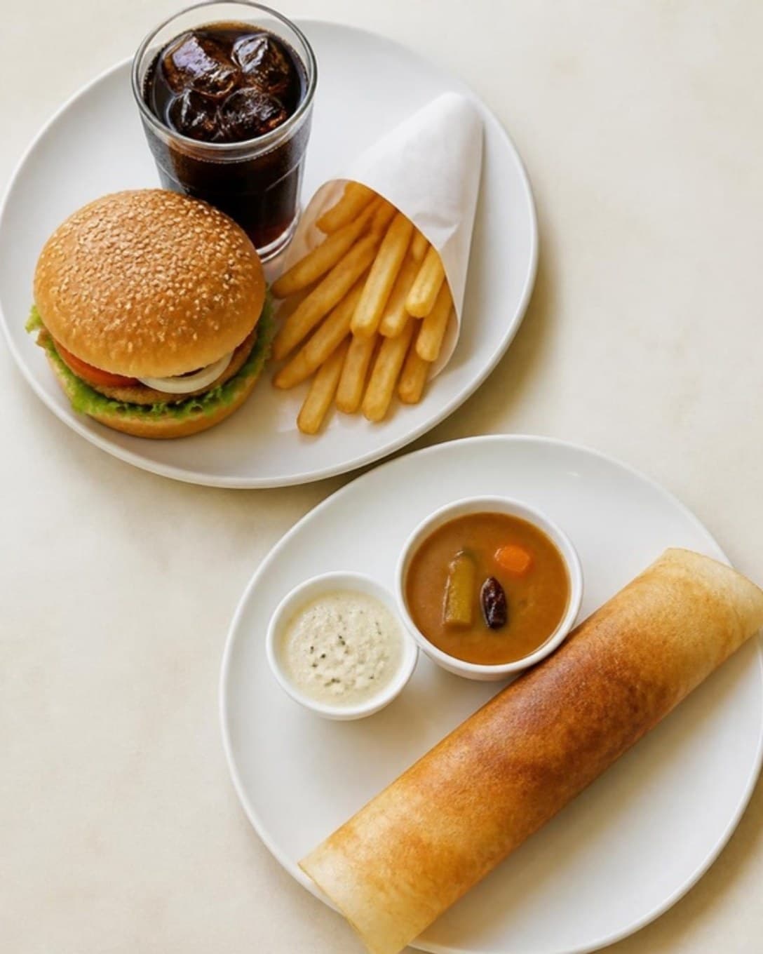 Burger meal and dosa plate served as combos